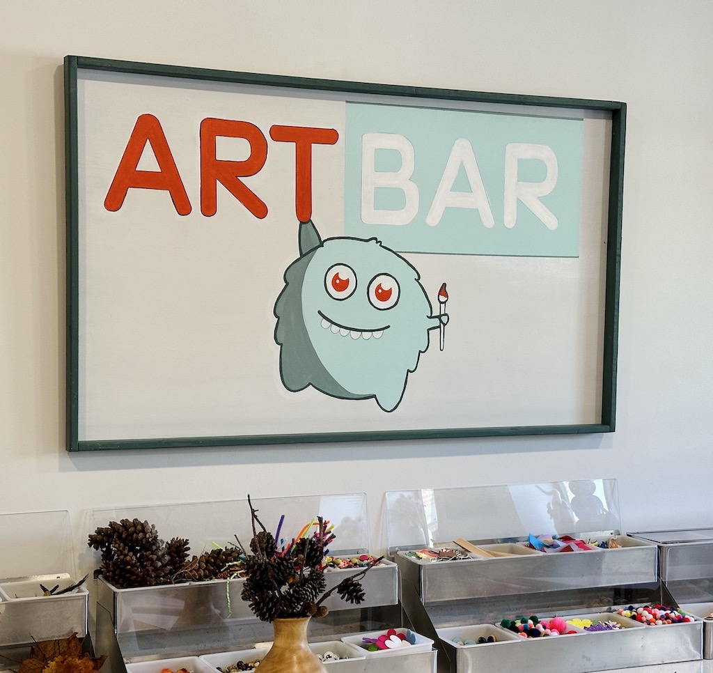 The Little Beasties art bar stocked with supplies
